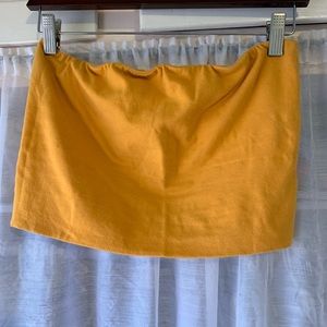 Mustard yellow tube top.